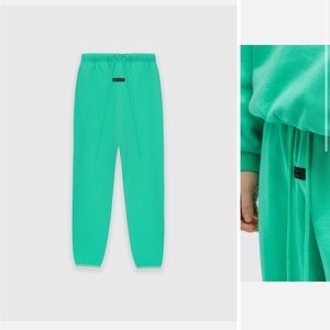 Fear of God Essentials sweatpants limited edition green color